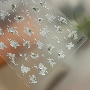 3D embossed butterfly and flower nail stickers with pearl accents and silver outlines