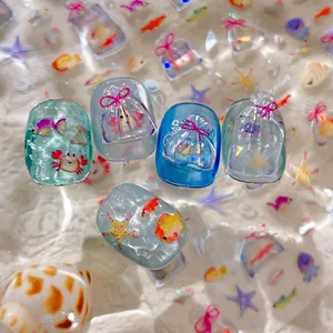 Stickers à ongles 3D thème océan avec crabes bleus, poissons et motifs d'étoiles de mer