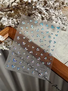 Detail view of dark blue laser butterfly nail stickers with YT6334Pro model numbering