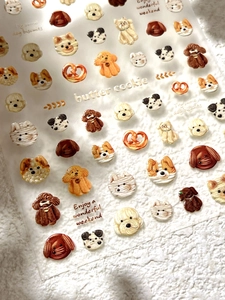 3D embossed nail stickers featuring cute dog heads and butter cookie designs