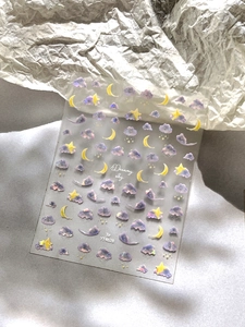 Detailed macro of YT4628 dreamy sky nail stickers with clouds, moon and star patterns