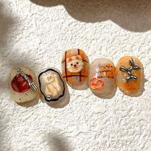 Caramel brown 3D embossed press-on nails featuring cute puppy and balloon dog designs