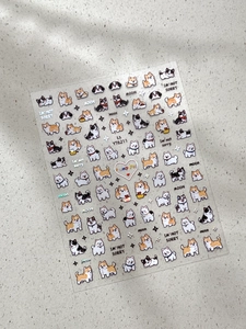 Détail d'autocollants pour ongles laser argenté avec motifs de chiens Corgi et Shiba Inu