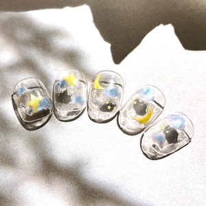 Dreamy star and moon nail art stickers with blue polar clouds and black cat silhouette