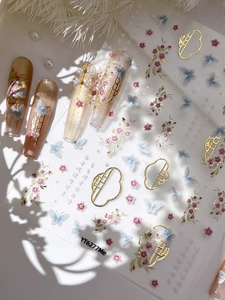 Detailed gold foil butterfly and floral embroidery nail stickers with delicate pearls