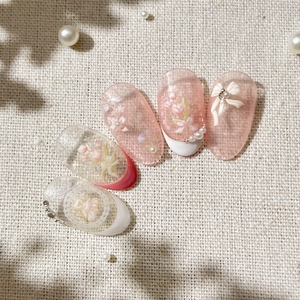 Relief tulip bear nail art stickers with 3D bows and pearls on elegant pink nails