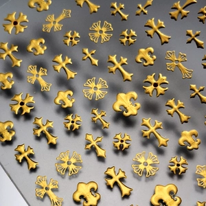 Autocollants métalliques croix et fleur de lys dorés pour décoration d'ongles chic