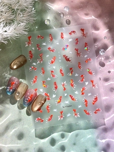 Macro detail of YT6091 koi fish and lotus nail stickers on artistic water ripple display