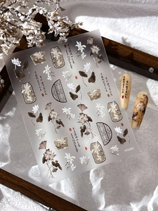 Detailed view of 3D embossed lotus nail stickers with traditional Chinese ink art and calligraphy