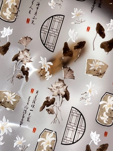 Detailed view of 3D embossed lotus nail art stickers with traditional Chinese ink motifs