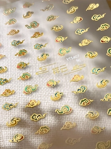 Detail of YT5407 Chinese style nail stickers featuring golden embossed auspicious clouds