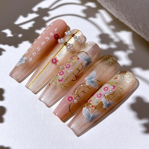 Long coffin gold-stamped flower butterfly press-on nails with pink gradient and pearls
