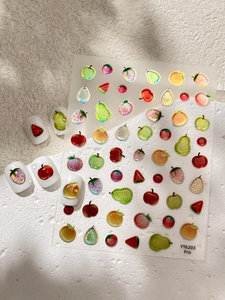 Macro detail of 3D jelly fruit nail stickers with laser finish and embossed texture