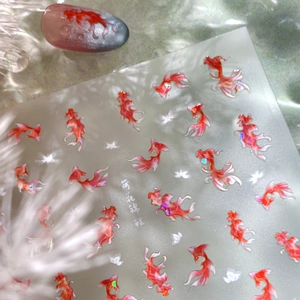 Koi fish and lotus nail art stickers with shimmering pearlescent finish and floral patterns