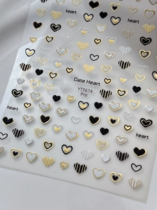 Détail des stickers ongles YT5674 Pro avec motifs de cœurs gaufrés dorés