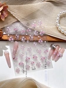5D embossed rose and bow nail stickers featuring realistic floral textures and long nails