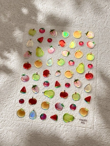 Detailed view of YT6203 Pro laser 3D nail stickers featuring colorful fruit patterns