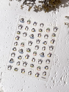 Détail des stickers ongles YT6262 en relief avec divers pingouins mignons de dessin animé