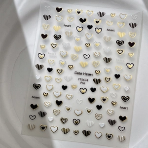 Autocollants nail art cœur doré en relief aux motifs minimalistes noirs et blancs