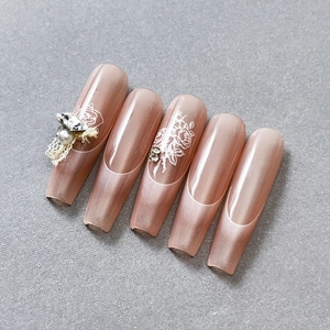 French gradient cat eye press-on nails in pink with floral patterns and 3D pearls