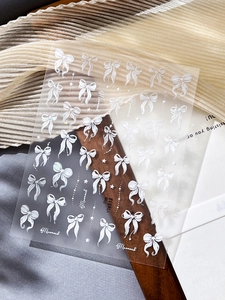 Detail of YT6512 3D white bow nail stickers with lace textures and pearl designs