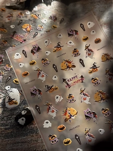 Detail of Halloween nail stickers with 3D embossed pumpkin, ghost and witch motifs