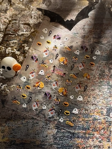 Halloween nail art stickers YT4332 with pumpkin, ghost and witch designs on dark background