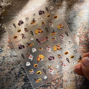 Halloween nail stickers with pumpkins, witches, and ghosts designs for nail art decoration