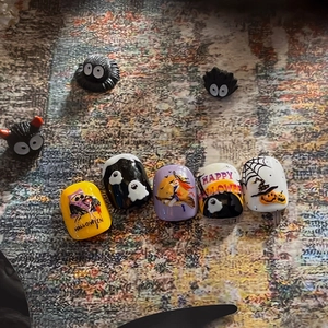 Halloween relief nail stickers with hand-painted witch, ghost, and pumpkin designs