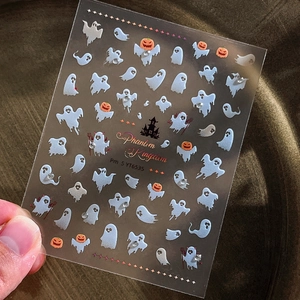 Halloween nail stickers with cute white ghosts, pumpkins and shiny diamond accents