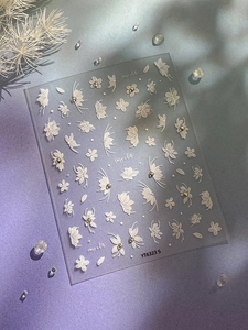 5D embossed white flower nail stickers with butterfly patterns and metallic accents