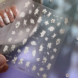 5D embossed pure white nail stickers featuring floral and butterfly designs with rhinestones
