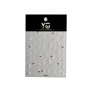 3D embossed nail art stickers with white floral and butterfly designs and small rhinestones