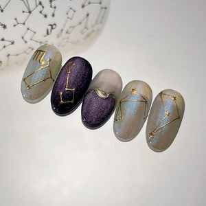Starry sky purple constellation press-on nails set with gold star and moon patterns
