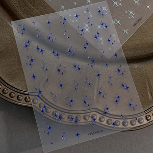 Silver laser cross star nail art stickers with minimalist sparkling star patterns