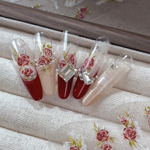 Vintage rose press-on nails with wine red accents, white lace and pearl decorations