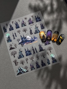 Detail of gothic Halloween nail stickers with castle, bat motifs and dark blue night theme