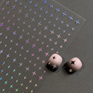 Holographic star nail art stickers with laser finish on gradient fake nails display