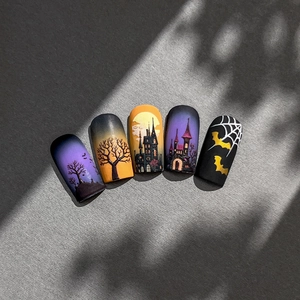 Halloween nail art stickers featuring dark castle, purple ombre, and bat designs