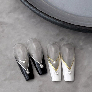 Elegant coffin press-on nails with French V-tip, pearls and pear-shaped zircon drops