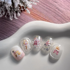 Christmas 3D nail art stickers featuring snowman and snowflake designs on white tray