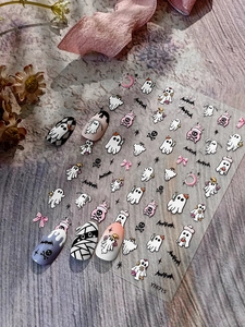Detail of Halloween ghost and bat nail stickers with embossed patterns for manicure