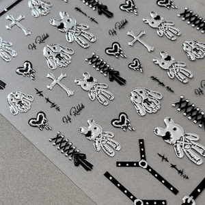 Silver gothic bunny nail stickers with punk hearts and metallic silver star patterns