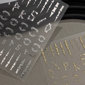3D metallic skeleton nail stickers in gold and silver for Gothic Halloween nail art decor