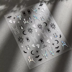 Halloween nail stickers with spiders, ghosts, and silver holographic glitter stars