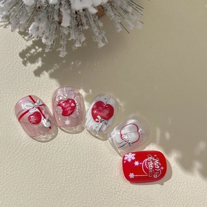 Stickers ongles de Noël avec nœuds 3D rouges, flocons et texte Merry Christmas