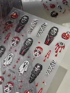 Detailed 3D embossed Halloween nail art stickers with vampire and pumpkin designs