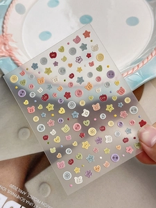Detail of 3D embossed cute bear and heart nail art stickers with matte texture