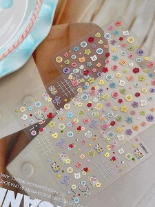 Detail of 3D embossed cute bear and colorful button nail art stickers with summer theme