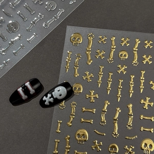 3D embossed Halloween nail art stickers with gold and silver skull and bone designs